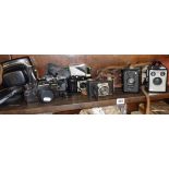 Collection of old Cameras, including Praktica, Zeiss , Kodak Retina 1 , and Olympus including cases