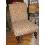 Victorian upholstered nursing chair on turned legs