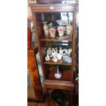 Late Victorian mahogany shop display cabinet with single door on stand with inlaid friezes, 66" tall