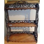 Victorian mahogany three tier wall shelf on fretwork supports and galleries