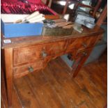 Edwardian walnut kneehole desk with four drawers on square tapering legs