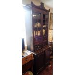 Georgian mahogany bookcase, having two door glazed upper section above two cupboard doors,