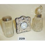 Hallmarked silver bedside clock together with silver topped vanity jar and silver collared cut glass