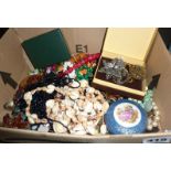 Box of assorted vintage costume jewellery, brooches, necklaces etc.