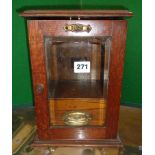Edwardian oak smoker's cabinet with bevelled glass door and fitted interior