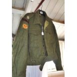 WW2 Royal Marine officer's battledress jacket with shoulder badges over a yellow star and "G"