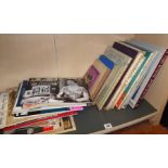 Shelf of books and magazines on royalty