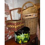 Quantity of assorted wickerwork baskets (8), a bucket and a parasol