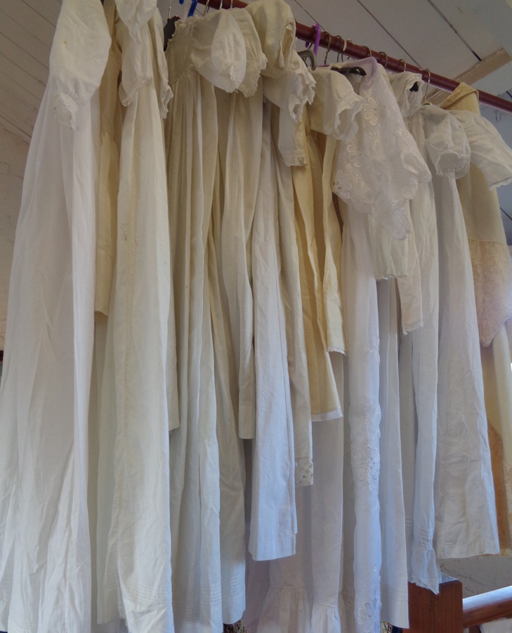 23 various christening gowns and dresses