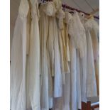 23 various christening gowns and dresses