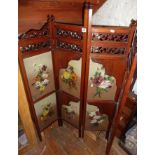 Victorian mahogany folding screen with painted glass panels and shaped corner shelves, heavily