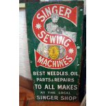 Large Victorian enamel advertising sign for Singer Sewing Machines, approx. 57.5" x 27", rust/wear