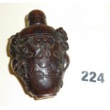 Carved horn Chilong Chinese snuff bottle