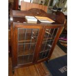 Oak bookcase with glazed leaded doors