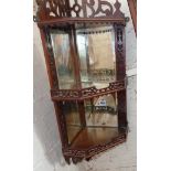 Victorian mahogany corner shelf with mirrored back and fretwork galleries