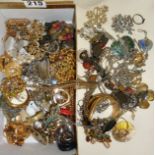 Box of vintage costume jewellery, gold tone brooches, etc.