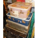 Two old laundry boxes and two vintage suitcases