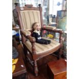 Victorian Gothic oak child's chair with turned arms and stretchers