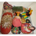 Box of antique and vintage pincushions, dolls, box, etc.