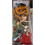Good lot of vintage costume jewellery, beaded necklaces, brooches, etc.