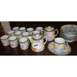 Japanese eggshell porcelain tea set in the "Thousand Flowers" pattern (12 cups and saucers, some A/