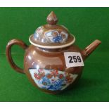 Chinese brown glazed teapot with floral panels