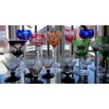 Collection of tall coloured and cut wine glasses and others