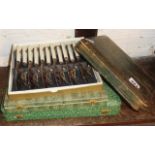 Three vintage cased cutlery sets and an ivorine manicure set, in case