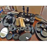 Collection of assorted ebony dressing table sets with brushes, hair tidy's, trays etc