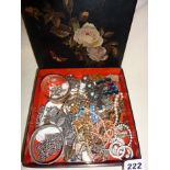 Vintage and older jewellery in a lacquered box, some silver