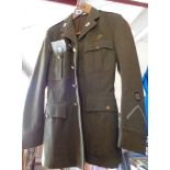 WW2 1941 ATS jacket with label, shoulder cord and buttons, together with a photograph of the lady