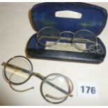 Two pairs of old spectacles one WW2 pair for a respirator or gas mask and the other tortoiseshell