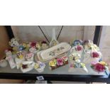 Collection of assorted bone china flower ornaments