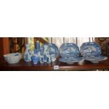 Shelf of assorted Oriental blue and white china vases and dishes inc. Sake bottles and Chinese