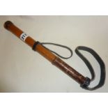 Vintage truncheon or cosh with leather strap