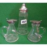 Pair silver topped glass olive oil bottles and an etched glass sugar sifter with silver top (A/F)