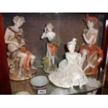 Three detailed Capodimonte figures, and another Continental porcelain lady figure