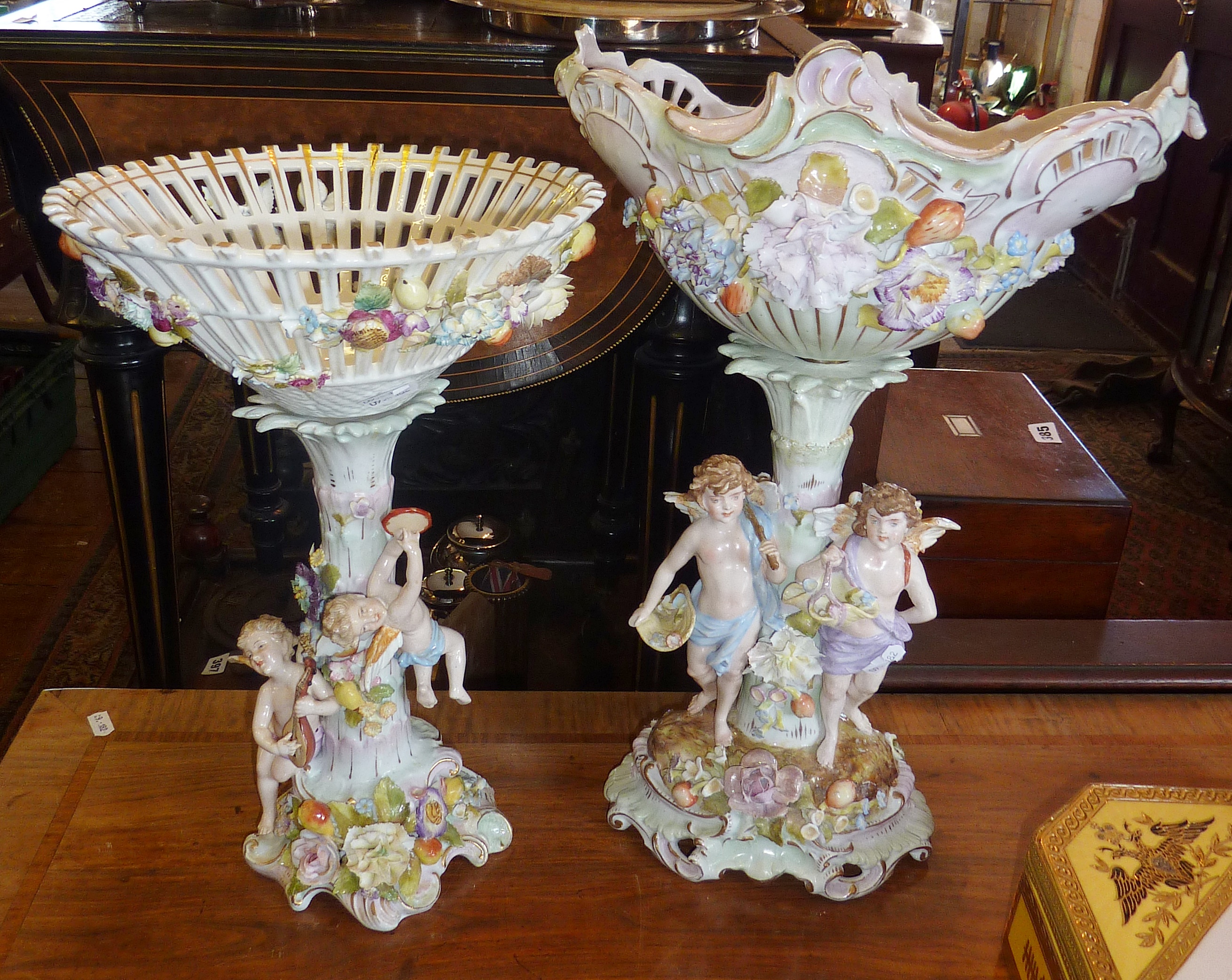 Austrian or German porcelain figural centrepieces, decorated with cherubs and flowers (both - Image 3 of 3