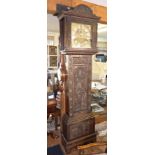 19th century Grandfather clock in carved oak case with 13" square brass dial, silvered chapter