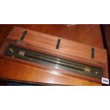A Stanley of London Draughtsman's rolling ruler in mahogany case