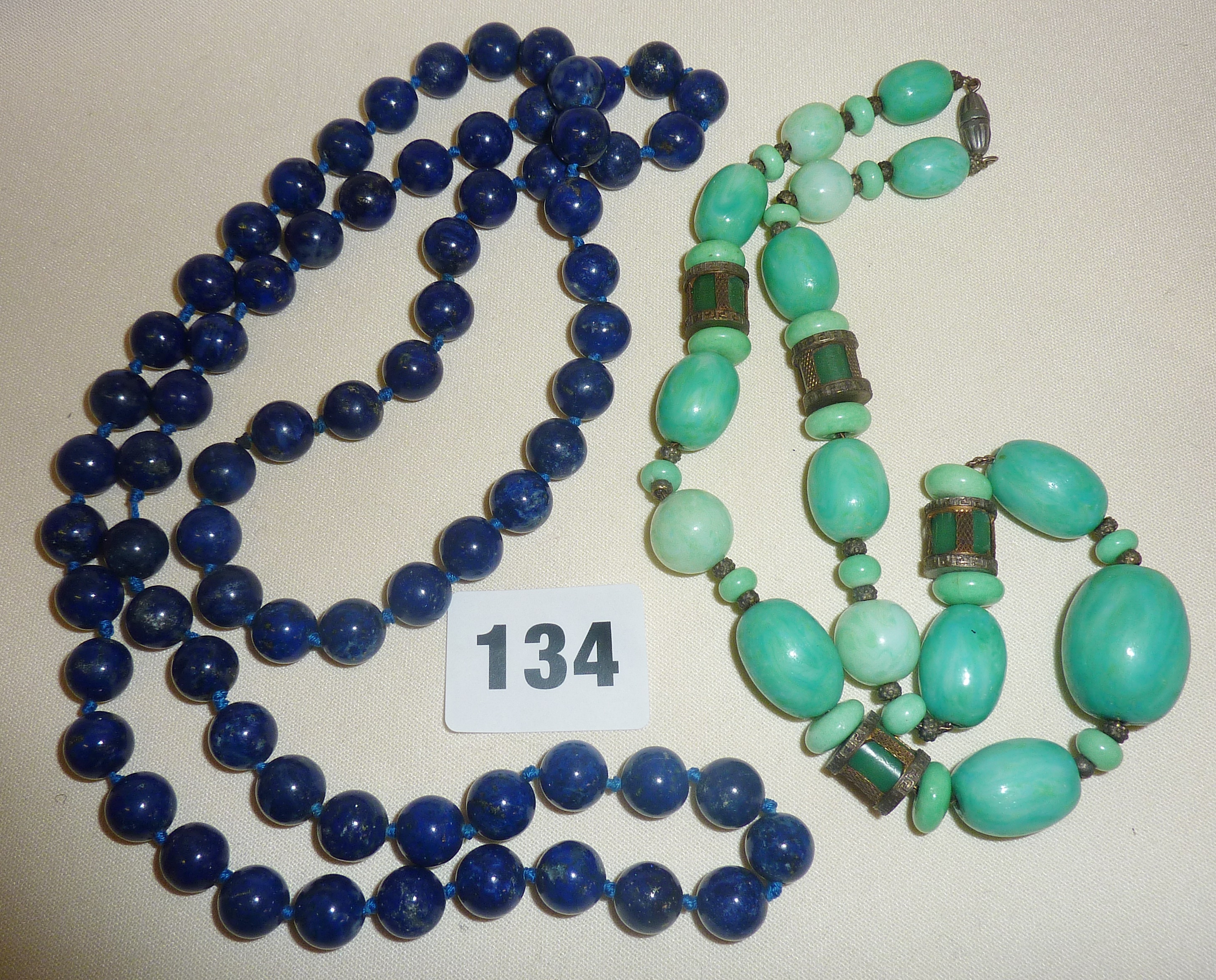 Old Chinese jade coloured Peking glass bead necklace, and a lapis lazuli beaded necklace