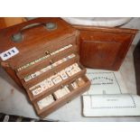 Vintage Mah Jong set in wooden box with drawers, counters made from bamboo and bone, including old
