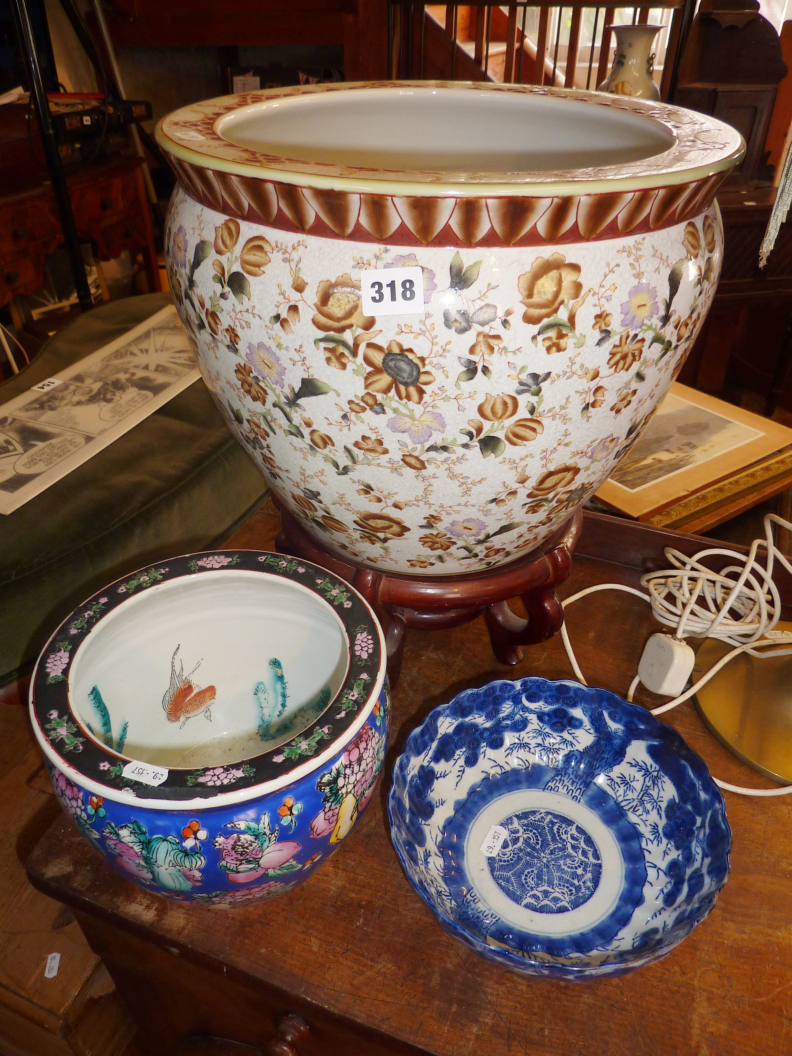 Large Chinese porcelain jardiniere on stand, blue and white bowl and another planter decorated