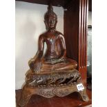 Large Oriental bronze figure of a seated Buddha, 45cm high