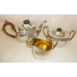 Three piece solid silver tea set with mark for St. Petersburg and engraved date of 1817 (approx