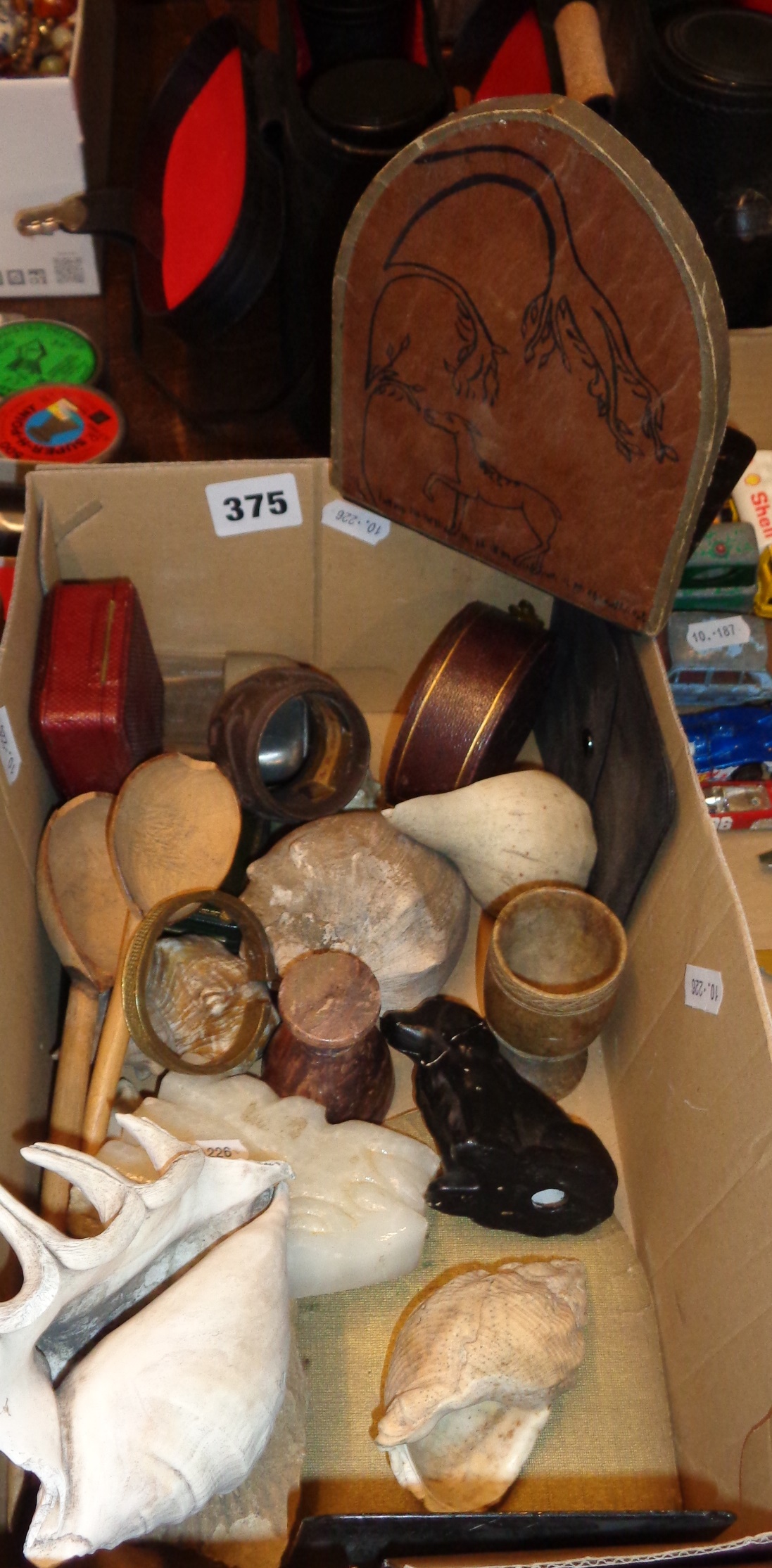 Old shells, carved soapstone, jewellery boxes, bookends, etc.