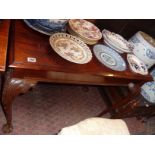 19th century mahogany library table, on carved cabriole legs with ball and claw feet