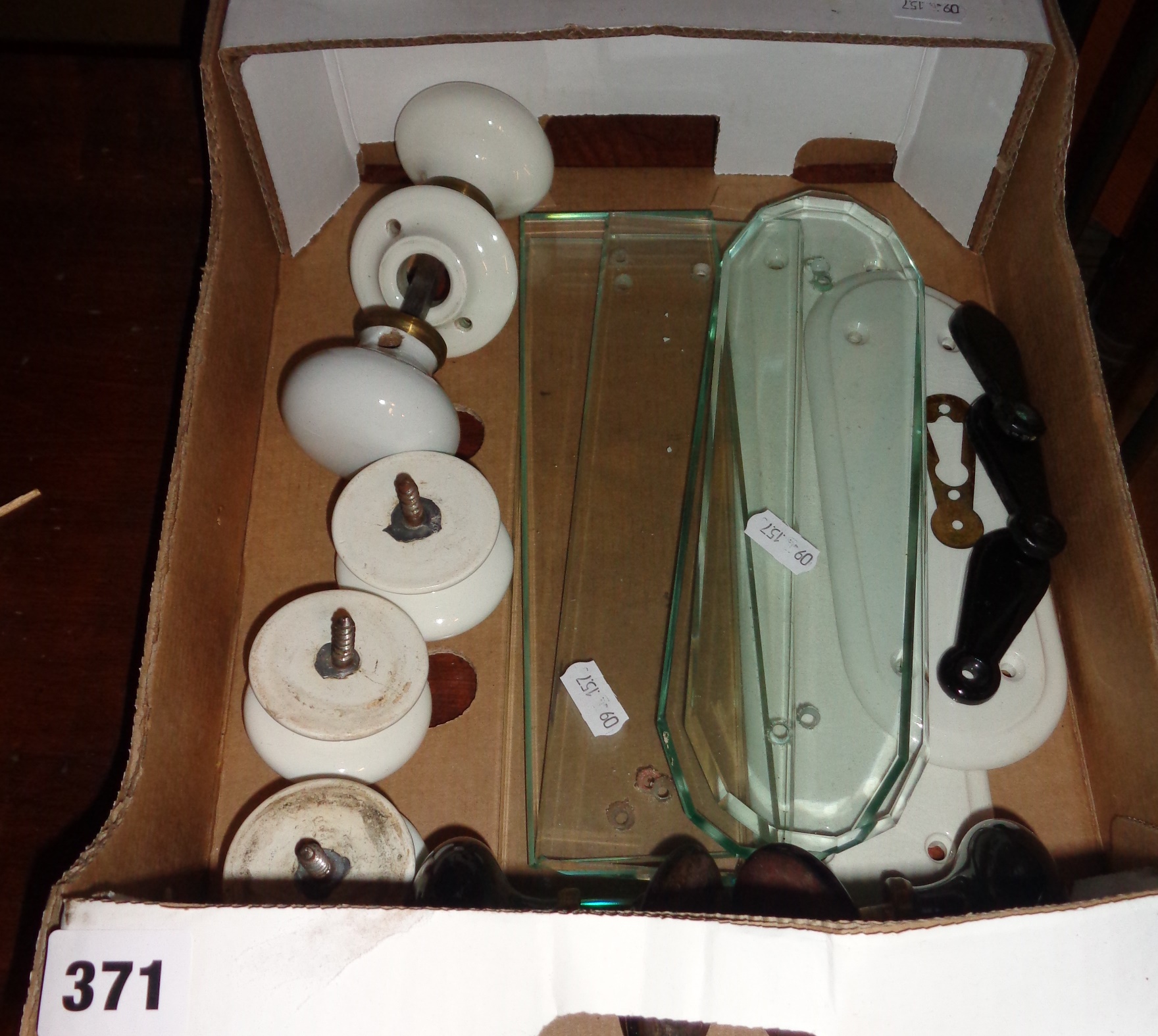 Assorted old door furniture, glass and china finger plates and doorknobs