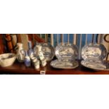 Shelf of assorted Oriental blue and white china vases and dishes inc. Sake bottles and Chinese