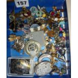 Box of vintage jewellery, old enamel badges, some silver pieces